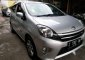Toyota Agya E MT 2013 Silver Dp Ccln Murah-2